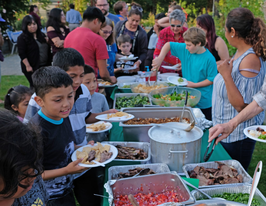 People serve themselves food